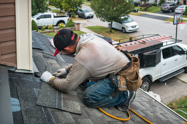 Professional Roofing technician working in Toms River, NJ
